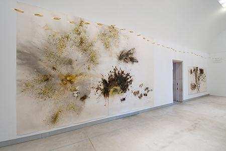 Figure 28: Cai Guo-Qiang, 99 Boats, 2002. Gold, hung from ceiling.