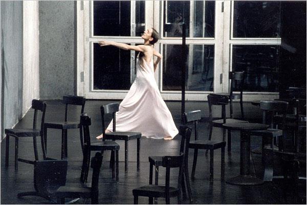 Photographer Unknown. Pina Bausch in Café Müller. 1978. The New York Times. She dances with her eyes closed for most of the work, adopting a sleeplike and dreamlike aura that permeates.