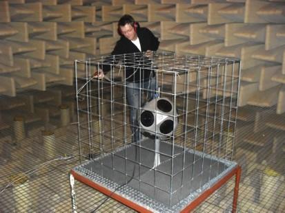 reference source); (b) Measurement setup in the anechoic