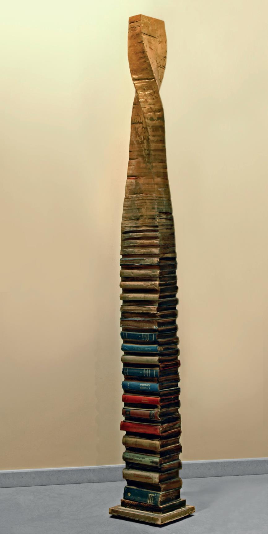 The sculptures, belonging to the vertical libraries series, are stacks of real books. They emerge from the reality of the materiality of the immediate and acquire a pure, spiritual dimension.