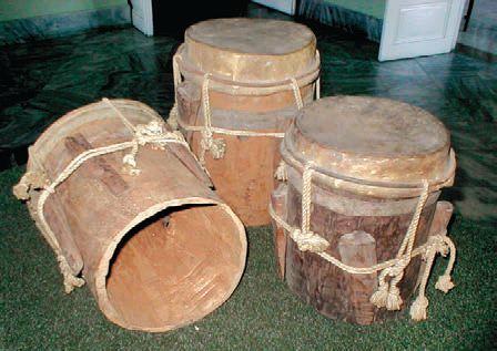 Snapshot: Cuba 5 CAPITAL CRAFTSMANSHIP. Antique abakua drums at the Museum Of Music, Havana.. Typical timbales.. &. Sonoc Drum factory. 5. Beco makes handmade bells for the top players.