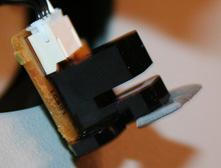 Example of a two-sided adhesive tape used to prop the sensor assembly. Simply cut a small piece and stick to the front as illustrated.
