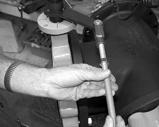 Adjust the distance between the yoke centers to match the hole in the MASTER valve crank arm.