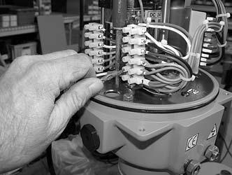 Apply proper actuator voltage to terminals #1 (Neutral) and #4 (Hot) to drive the actuator CLOSED until the end-of-travel cam STOPS the actuator movement. (Note that there is no terminal #2).