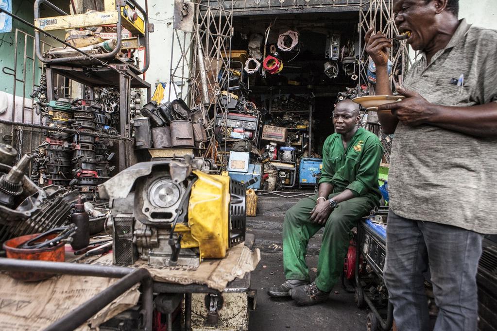 Lagos, Nigeria. The Ebutte Meta market specializes in small- to medium-size generators, both for retail or, like this shop, for maintenance.