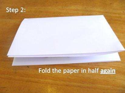 Secondly, fold the paper in half again. Thirdly, fold the paper in half a third time. Unfold the paper as far as the first fold.
