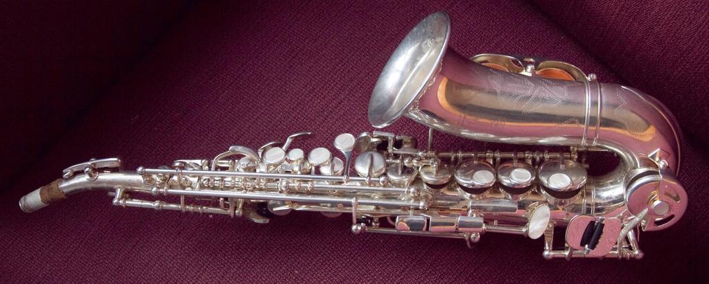 Figure 4: Boehm model traversoe. The saxophone, that was patented at the same time, continues the sophistication of these user interfaces, with a large amount of pads, keys and mechanical details.