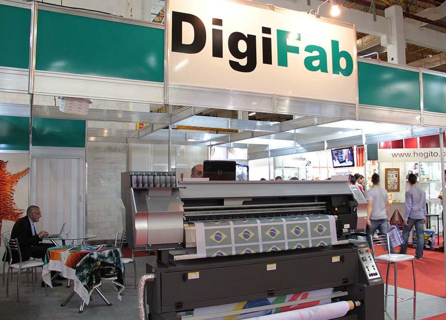 Textile printers The nice DigiFab booth had a DigiHeat transfer machine and StampaJet BP-64 (sticky belt textile printer), at the intersection of Ave. 1 and Aisle H.