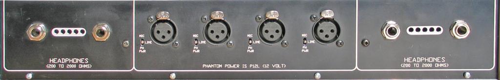Two eight LED PPMs are provided to indicate the PGM and TB levels. Front Panel On the front panel there are 4 audio input XLRs. To the left of each of these XLRs is a small recessed toggle switch.