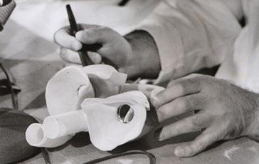 Michael DeBakey inserted the artificial heart into DeRudder during 5 hours of surgery 4/21 at Houston
