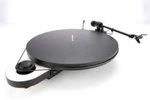 Manual turntable for simplicity and best sonics.