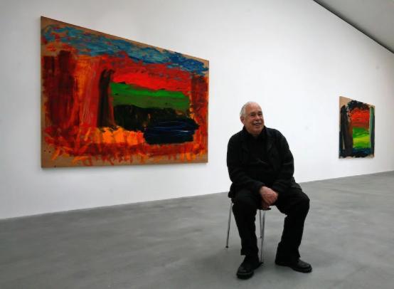 The late Howard Hodgkin (1932 2017) with a suite of his paintings, in 2008. Photo by Cate Gillon/Getty Images.