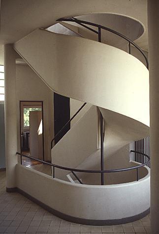 Figure 9: Villa Savoye Staircase (Le Corbusier) The use of lines on a design surface can lessen the massing effect, breaking the bulk down into smaller perceived pieces.