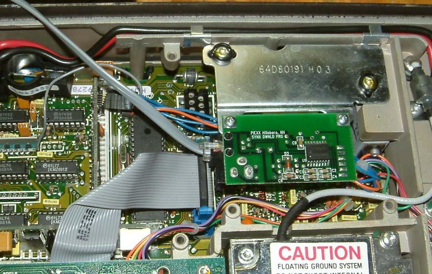 Make sure that the plug is oriented with the orange lead connected to pin 1 of the SynXFlash module.