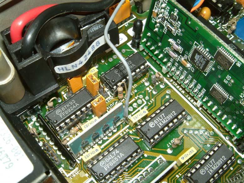5. The revision C serial interface adapter has mounting holes that will allow it to be permanently installed in the radio.