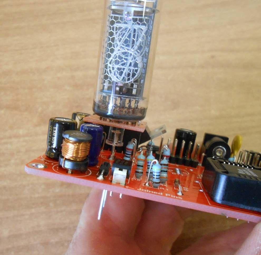 Then, place a Nixie Tube assembly into position on the 6X2 connectors.