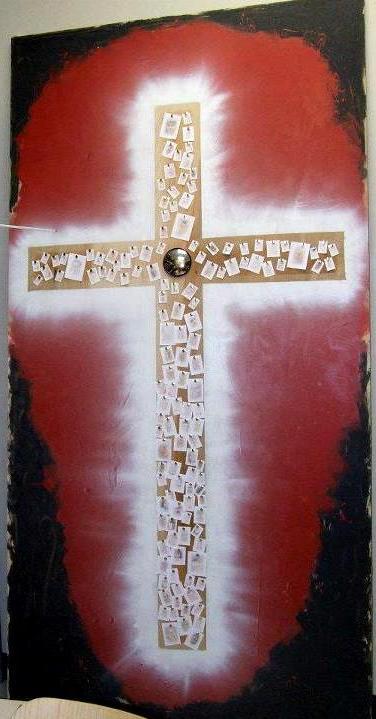 ART AND SYMBOLISM 31 Crux This large scale work is loaded in symbolism. The black paint on the outside represents sin and fallen humanity. The red surrounding the cross represents Christ s blood.