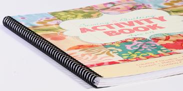 What plastic spiral binding may cost Typically used for books that need to lie flat, such as cookbooks or manuals. Pricing is for black spiral. Color spiral binding: $5.00 additional per 100.
