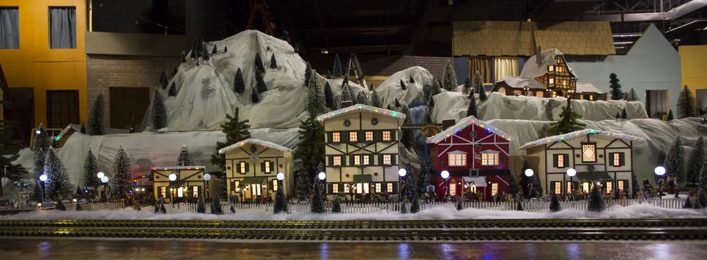 The' N. Pham A miniature Dickens' Christmas Towne with railroad train is part of the Nauticus' Dickens Christmas Towne village inside Half Moone Cruise and Celebration Center in Norfolk, Va.