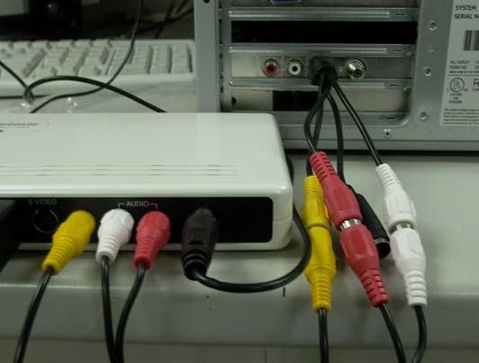Connect the 4-in-1 video input cable to the TV tuner card then plug video cable (Yellow connecter) and audio cable
