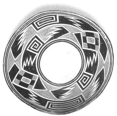 82 Figure 6: Mimbres Black-on-white bowl, Style III, geometric, A.D. 1000-1150.