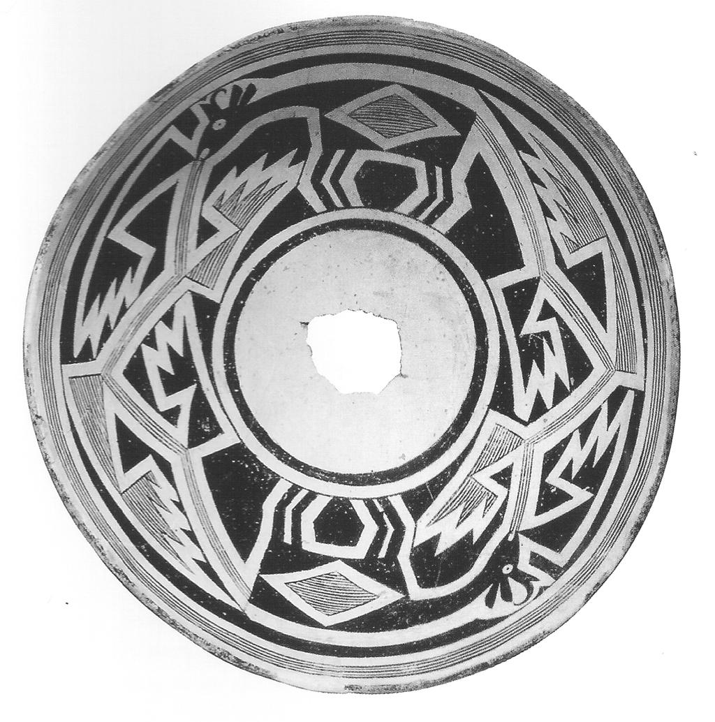 83 Figure 7: Mimbres Black-on-white bowl, Style III, pronghorn deer intertwined with geometric design. A.D. 1000-1150.