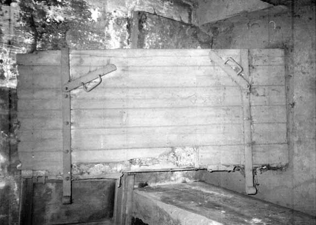 AUSCHWITZ: CREMATORIUM I Document 32: Gas-tight wooden door found in the vicinity of