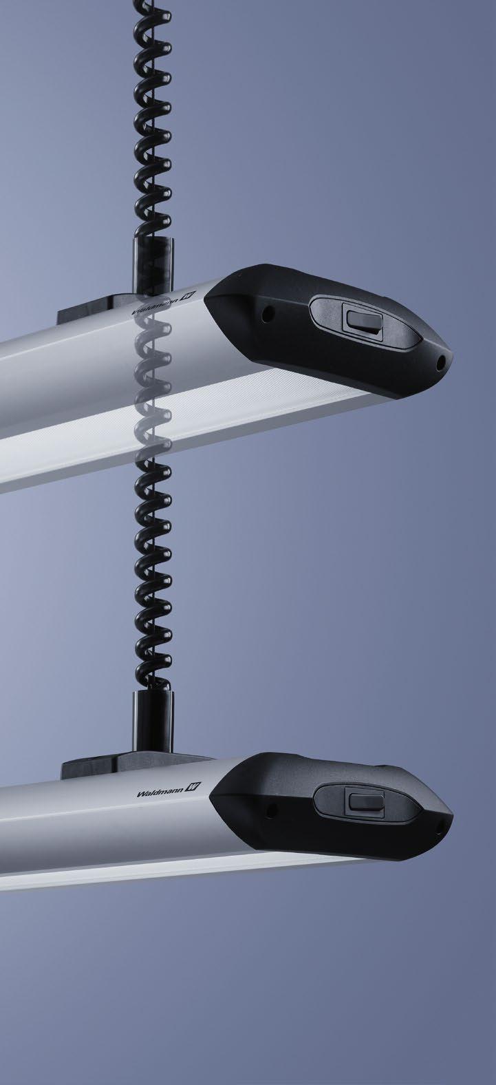 60 TAMETO with suspended mounting is the first choice when a continuously height-adjustable workplace-system luminaire is required.