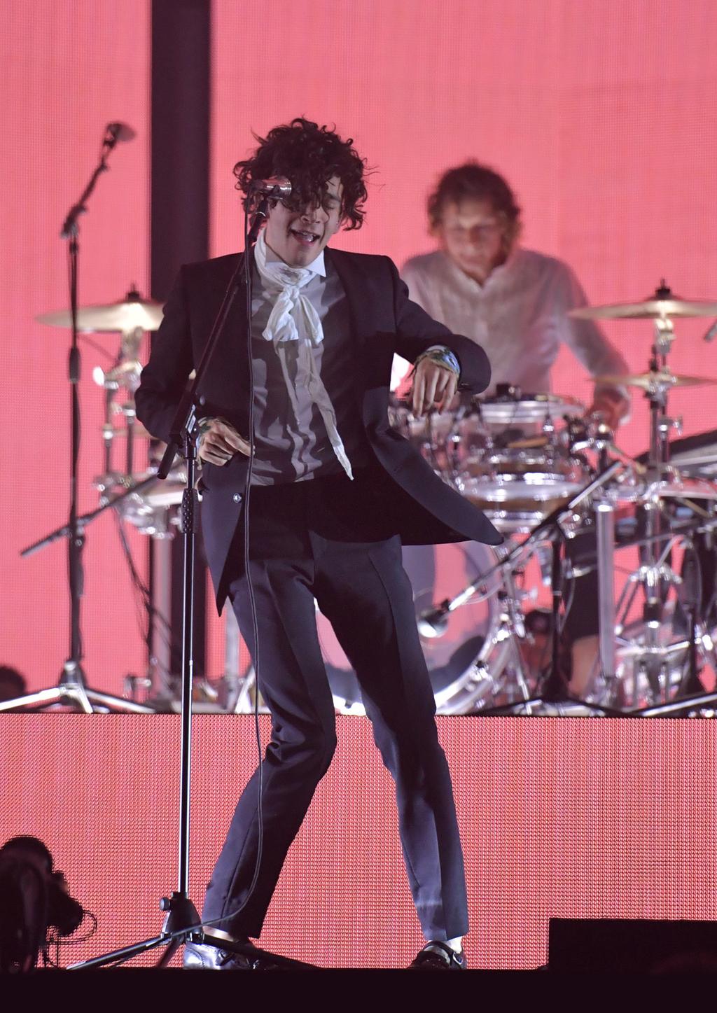 IMAGE Photo Credit The 1975 performing at the Brit