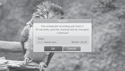 Recording and Playback English Recording Conflict You can watch another channel while recording a channel or record programmes from two different channels at the same time.