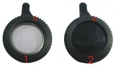 Place the goboholder on a clean, flat work surface with the teeth facing upwards. The gobo is held in place in the gobo holder by a spring.