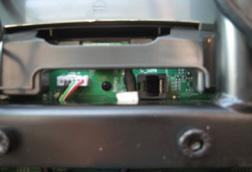 18) Plug the controller wire from the TV bracket kit into the C-Safe Board near the top of the