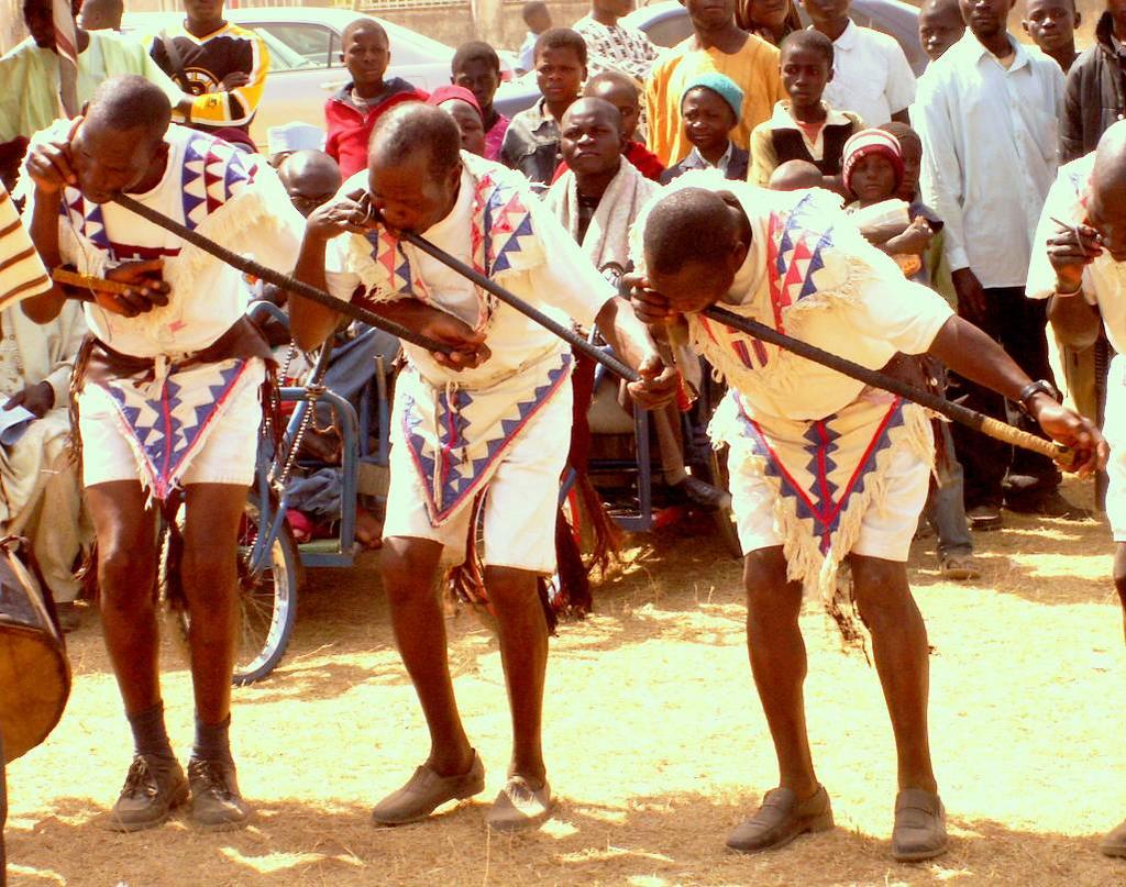 As an example, Photo 19 shows the velaŋ, a transverse clarinet ensemble characteristic of the Mwaghavul people of Central Nigeria at the Wus Festival in Panyam in 2010.