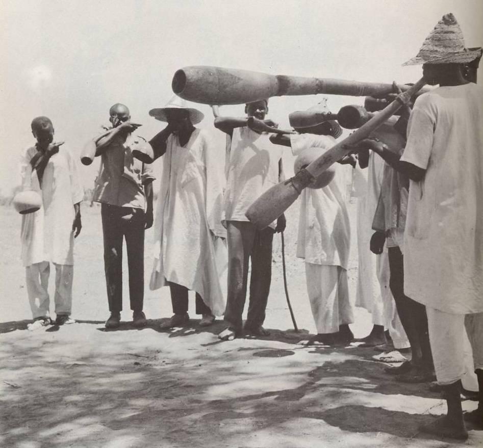 shows an ensembles of flutes and trumpets among the Tupuri of Chad, photographed in the 1960s.