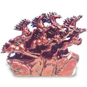 A red laquer statue of the Eight Horses of Success Photo printed with permission of http://www.dragon-gate.com Celestial Elephant.
