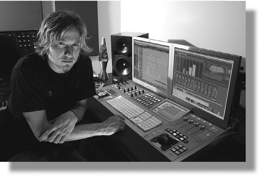 Chapter 1 What Is MIDI? 9 Figure 1.6. Steve Tushar, sound effects editor and musician, with his MC Media Application Controller running Nuendo. (Photograph courtesy of Andrew Wild, Euphonix, Inc.