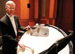 Timpani are drums that look like huge copper bowls with a special covering stretched over the top.