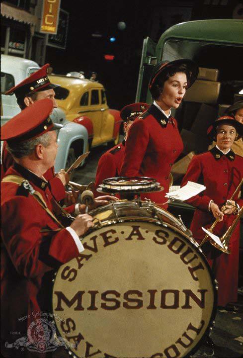SAINTS AND SINNERS The Save-a-Soul Mission from the 1955 Guys and Dolls film. The Save-a-Soul Mission featured in Guys and Dolls was based on the Salvation Army.