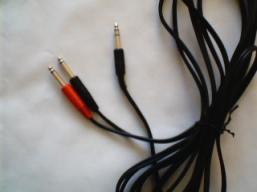 Picture 1. A standard stereo 1/4" jack cable split in two 1/4" mono jacks, also known as INSERT CABLE.