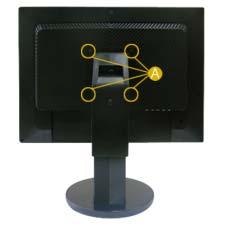 Lay the LCD monitor face-down on a flat surface with a cushion beneath it to protect the screen. 3.