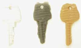 They were taken from a flexible mould which was created by pressing my front-door key into wet silicon.