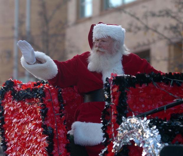 Santa waves to the crowd at the 25th annual Downtown Brockton Holiday Parade on