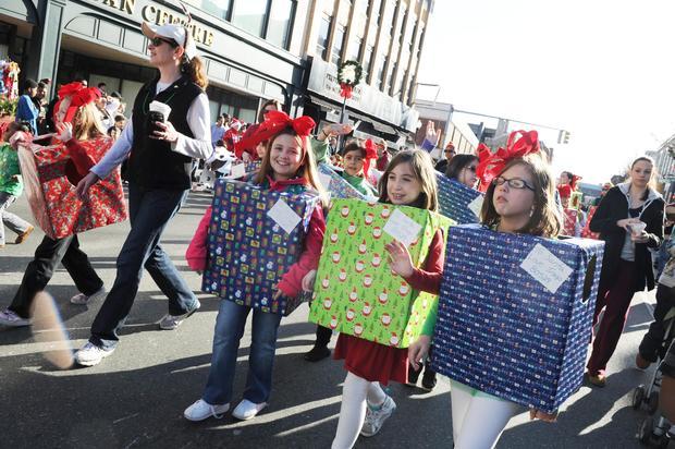 Brockton Girl Scouts dressed as gifts in the 25th