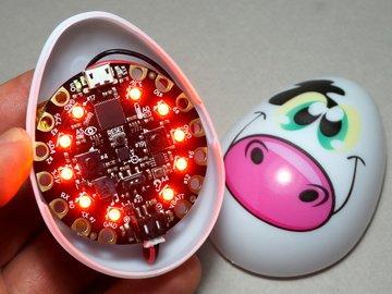 Here's the first egg with the Circuit Playground and the small LiPo battery installed. Ready to be closed up!