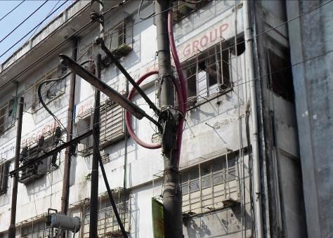 Disconnect the transformer from the electrical system before maintenance work and cleaning. Transformer room Finding #: E- 7 SERVICE CABLE Excess service cable coiled on pole not supported.