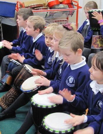 YEAR 2 As well as drumming, Year 2 put a lot of effort into music for their Christmas production.