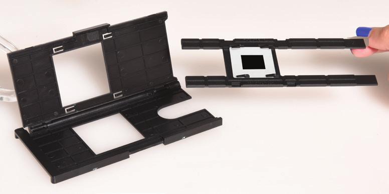 This film scanner features speed-load adapters to