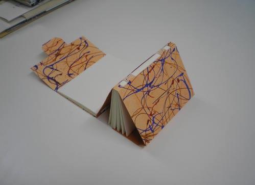 Kyle, in her Pocket book (figure 5), has invented a new structure by folding paper to create individual pockets.