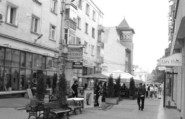 Photo 3. Lăpușneanu Street, nowadays One could see here great concert pianos, double-basses, cellos, and all sort of brass instruments, also gramophones, long play discs, scores.