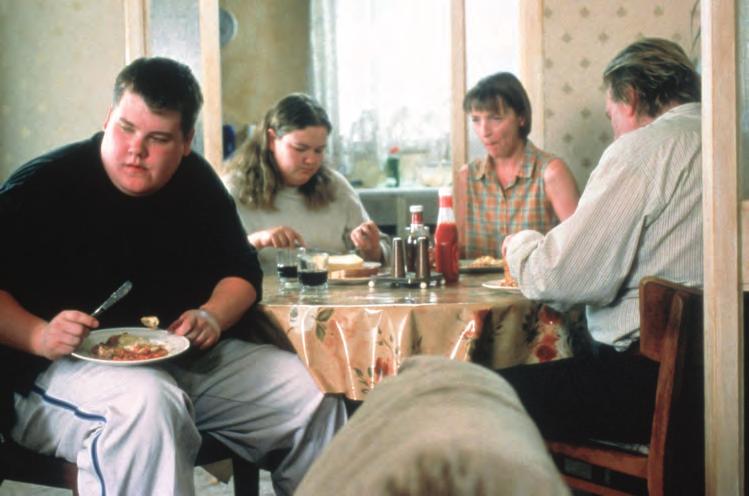 82 Mise en Scène 2 28. All or Nothing (Britain, 2002), with Timothy Spall (extreme right, in three-quarterturn position), directed by Mike Leigh.